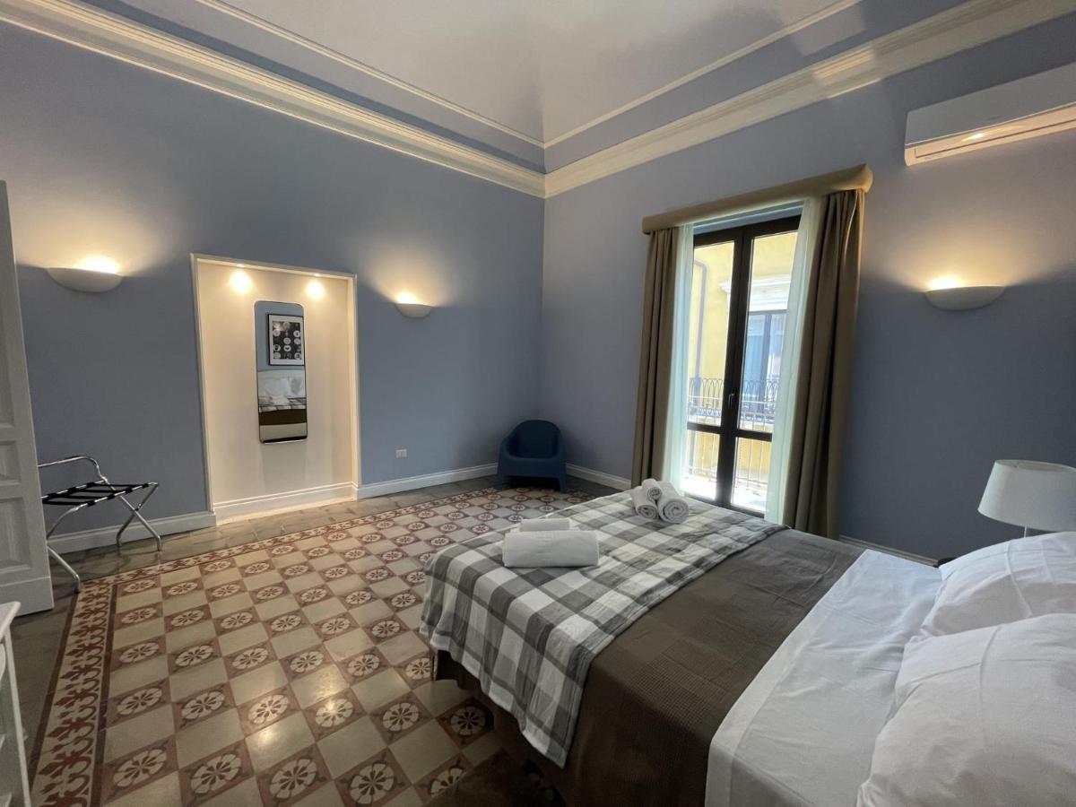Faraone Apartments Catania Bagian luar foto